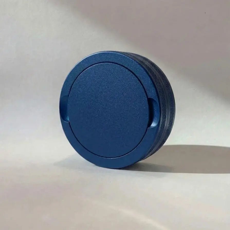 Pouchy Slim in navy blue — slim metal snus pot, custom engraved in the UK